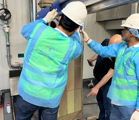 tetratech workers fitting industrial installations