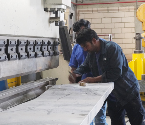 worker drawing sketch on paper